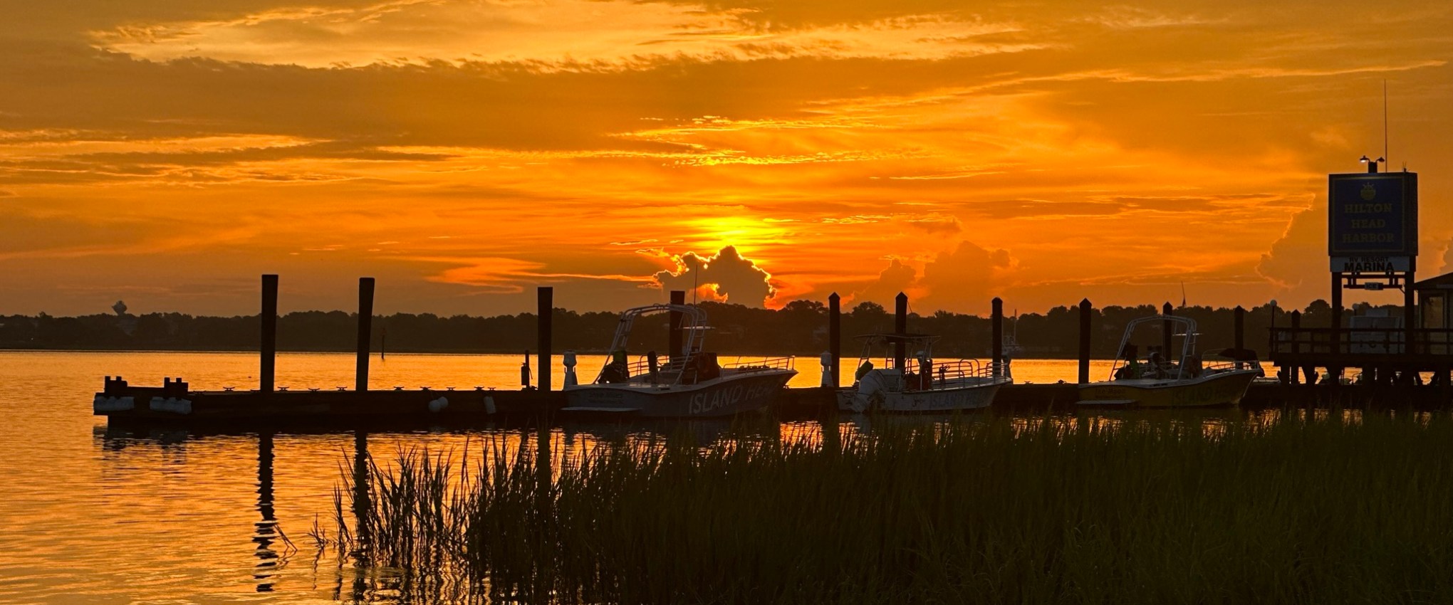 a sunset over a body of water