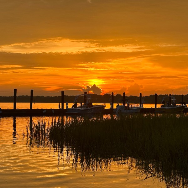 a sunset over a body of water